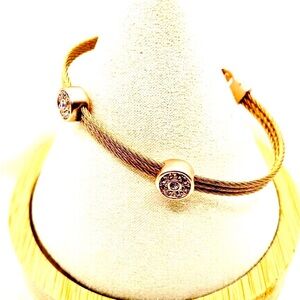 rose gold-toned cable wire bracelet featuring crystal-studded cylindrical